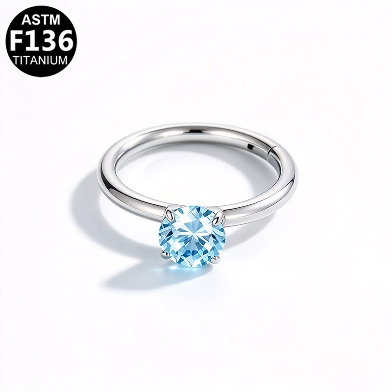 Jewel CZ hinged segment clicker with blue CZ, implant grade titanium