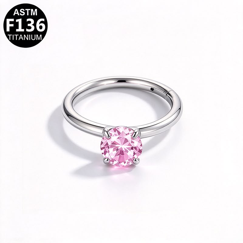 Jewel CZ hinged segment clicker with pink CZ, implant grade titanium